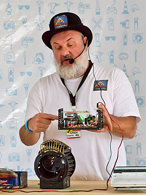 Mike demonstrating laser lunch boxen at Maker Faire Detroit